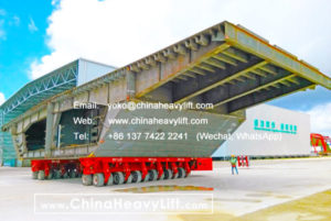 12 axle lines Self-propelled Modular Transporters SPMT side by side move Ship section hull segment